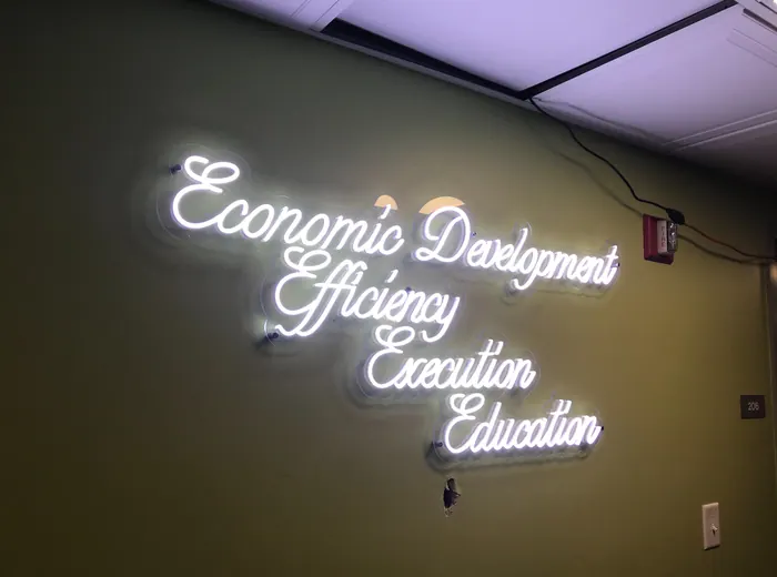 Custom faux neon illuminated script lettering