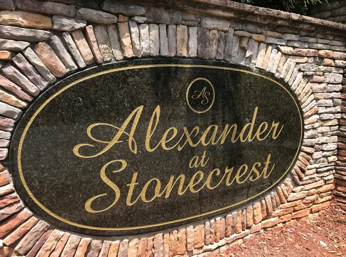Alexander at Stonecrest stone monument with engraved granite insert