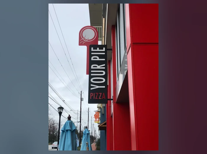 Custom projecting blade sign
